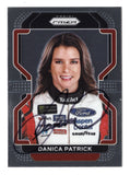 Front view of an autographed Danica Patrick 2022 Panini Prizm Racing TaxAct NASCAR trading card featuring the celebrated motorsports driver and her recognizable TaxAct sponsorship. This signed racing collectible includes a Certificate of Authenticity and makes an exciting addition to any NASCAR memorabilia or autographed trading card collection.