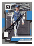 Distinctive gray parallel styling highlights Daniel Suarez on this autographed 2023 Donruss Racing NASCAR trading card. Featuring Suarez's signature and accompanied by a Certificate of Authenticity, this collectible celebrates the Trackhouse Racing driver who made history as the first Mexican-born NASCAR national series champion.