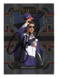 Autographed Denny Hamlin 2024 Panini Select Racing Grandstand #11 FedEx NASCAR trading card with Certificate of Authenticity and a rigid, plastic toploader included for protection and display. A premium collectible that makes a great gift for NASCAR fans and sports memorabilia collectors.