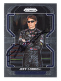 Front view of an autographed Jeff Gordon 2022 Panini Prizm Racing NASCAR trading card featuring his iconic #24 Pepsi Max Hendrick Motorsports Chevrolet and distinctive Panini Prizm design. This signed collectible includes a Certificate of Authenticity and appeals to Jeff Gordon fans, NASCAR enthusiasts, and racing memorabilia collectors.