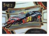 Front view of an autographed Jeff Gordon 2024 Panini Select Racing Pit Road Silver Prizm NASCAR trading card featuring the four-time Cup Series champion and distinctive reflective Silver Prizm insert design. This rare signed collectible includes a Certificate of Authenticity and appeals to NASCAR fans and racing card collectors.