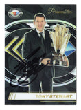 Tony Stewart's championship achievements are celebrated on this autographed 2023 Panini Prizm Racing Personalities Champion NASCAR trading card. Featuring the distinctive Personalities Champion insert design and Stewart's signature, this collectible honors the three-time Cup Series champion and includes a Certificate of Authenticity for NASCAR autograph collectors.