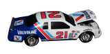 Collectible 1995 Buddy Baker autographed NASCAR diecast featuring Valvoline Racing sponsorship, detailed 1/24 scale design, authentic driver signature, vintage Action manufacturing, and included Certificate of Authenticity for display and collecting.