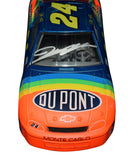 Collectible 1995 Jeff Gordon autographed NASCAR diecast featuring the legendary DuPont Rainbow Warrior design, Signature Series branding, precision 1/24 scale detail, and included Certificate of Authenticity for dedicated NASCAR fans.