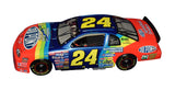 Rare signed Jeff Gordon RCCA Elite diecast from 1997 showcasing the iconic DuPont Rainbow paint scheme, Million Dollar Date edition markings, precision 1/24 scale craftsmanship, and exceptional display value for NASCAR collectors.