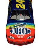 Collectible 1997 Jeff Gordon autographed NASCAR diecast featuring the legendary #24 DuPont Rainbow Warrior design, RCCA Elite construction, authentic driver signature, and included Certificate of Authenticity for serious motorsports memorabilia collections.