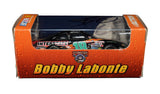Vintage 1998 Bobby Labonte #18 Small Soldiers Movie autographed NASCAR diecast car in collectible 1/64 scale. Featuring the memorable Small Soldiers promotional racing scheme and Bobby Labonte’s signature, this Action diecast includes a COA and makes a great gift for fans of classic NASCAR racing and movie-themed collectibles.
