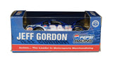Detailed view of an autographed 1999 Jeff Gordon #24 Pepsi Racing Action 1/64 scale NASCAR diecast. Featuring Jeff Gordon’s signature and recognizable Pepsi sponsorship, this collectible represents a popular special paint scheme from Gordon’s late-1990s racing career and includes a Certificate of Authenticity for added collector documentation.