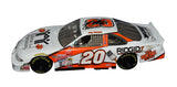 Close-up of the signed 1999 Tony Stewart #20 Home Depot Habitat for Humanity Rookie Car 1/24 NASCAR diecast showcasing the authentic autograph, special store exclusive design, recognizable Home Depot colors, and detailed racing graphics. An eye-catching collectible from Stewart's memorable NASCAR Cup Series rookie season.