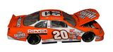 Signed 1999 Tony Stewart #20 Home Depot Rookie Car Action 1/24 NASCAR diecast featuring an authentic autograph, classic orange racing graphics, and detailed vintage styling. A memorable collectible from Stewart's three-win rookie season and a great gift for fans of Tony Stewart, Joe Gibbs Racing, and NASCAR history.