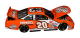 Signed 2000 Tony Stewart #20 The Home Depot Joe Gibbs Racing Action 1/24 NASCAR diecast featuring an authentic autograph, classic orange No. 20 paint scheme, and detailed collector styling. A memorable piece from Stewart's six-win 2000 season and an excellent gift for fans of vintage NASCAR racing.