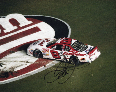 Signed 8x10 photo of Dale Earnhardt Jr. performing a burnout after winning the 2001 Daytona race in the #8 Budweiser MLB All-Star car. Features a clear autograph, vivid race detail, and strong collectible appeal. It makes a great gift, and we are always here to help with any questions.