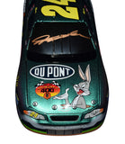 Collectible 2001 Jeff Gordon autographed NASCAR diecast featuring the iconic #24 Looney Tunes Racing design, vibrant Bugs Bunny artwork, authentic driver signature, and included Certificate of Authenticity for display and collecting.