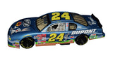Rare signed Jeff Gordon Looney Tunes NASCAR diecast showcasing the popular Monte Carlo 400 paint scheme, detailed Winner's Circle craftsmanship, vibrant graphics, and exceptional display value for collectors of motorsports memorabilia.