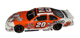 Close-up of the signed 2001 Tony Stewart #20 Home Depot Coca-Cola Polar Bear Action 1/24 NASCAR diecast showcasing the authentic autograph, recognizable No. 20 graphics, Coca-Cola Polar Bear theme, and detailed Action craftsmanship. An eye-catching collectible from Stewart's early NASCAR Cup Series career.