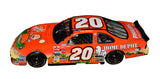 Close-up of the signed 2002 Tony Stewart #20 It's the Great Pumpkin Charlie Brown Action 1/24 NASCAR diecast showcasing the authentic autograph, detailed Peanuts character artwork, Halloween-inspired graphics, and classic Action craftsmanship. An eye-catching collectible combining NASCAR racing with a beloved seasonal television favorite.