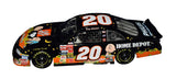 Close-up of the signed 2002 Tony Stewart #20 Search for the Great Pumpkin Charlie Brown Action 1/24 NASCAR diecast showcasing the authentic autograph, detailed Peanuts character artwork, Halloween-inspired design, and classic Action craftsmanship. An eye-catching collectible combining NASCAR racing history with nostalgic Charlie Brown imagery.