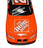 Collectible autographed Tony Stewart 2002 #20 The Home Depot Action 1/24 scale NASCAR diecast representing his first championship season with Joe Gibbs Racing. Featuring an authentic signature and recognizable Home Depot graphics, this vintage racing collectible captures a defining year in the three-time Cup Series Champion's legendary career.