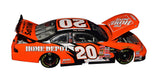 Signed 2002 Tony Stewart #20 The Home Depot Championship Season Action 1/24 NASCAR diecast with authentic autograph, classic orange racing graphics, and detailed collector styling. A memorable piece celebrating Stewart's 2002 NASCAR Cup Series title and an excellent gift for Tony Stewart fans and motorsports memorabilia collectors.