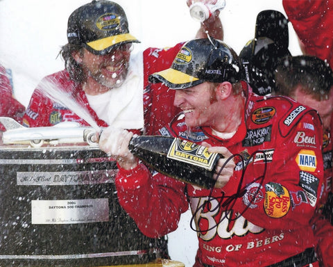 Autographed 8x10 photo of Dale Earnhardt Jr. celebrating his 2004 Daytona 500 win in the #8 Bud Born on Date car. Features a bold signature and vivid Victory Lane detail, perfect for collectors. It makes a great gift, and we are always here to help with any questions.