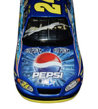 Collectible 2004 Jeff Gordon autographed NASCAR diecast featuring the iconic #24 Pepsi Shards design, detailed 1/24 scale construction, race-inspired graphics, and included Certificate of Authenticity for motorsports memorabilia collections.