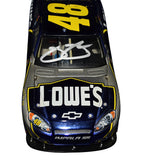 Collectible 2007 Jimmie Johnson autographed NASCAR diecast featuring the Car of Tomorrow body style, Race Fans Only exclusivity, detailed 1/24 scale craftsmanship, and included Certificate of Authenticity for serious collectors.