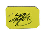 Close-up of signed Kyle Busch 2007 Cheez-It Racing race-used sheet metal from the Texas NASCAR race featuring visible race marks, authentic track-used character, and bold sponsor graphics. A rare collectible display piece perfect for serious NASCAR collectors and motorsports enthusiasts.