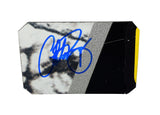 Autographed 2008 Clint Bowyer #07 Jack Daniel’s Snow Camo race-used composite NASCAR sheet metal from his Bristol car. This signed collectible is roughly the size of a standard trading card, fits inside a plastic toploader for protection and display, and includes a certificate of authenticity.
