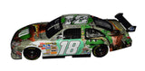 Autographed 2008 Kyle Busch #18 M&M's Indiana Jones Darlington 1/24 scale NASCAR diecast featuring an authentic signature, limited edition number #1968 of only 1,980 produced, a Certificate of Authenticity, and a photo of Kyle signing the car at M&M's World in Las Vegas.