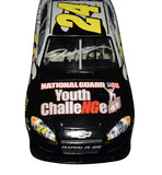 Signed Jeff Gordon #24 NASCAR diecast highlighting the distinctive National Guard Youth Challenge paint scheme, detailed construction, authentic autograph, and strong collector appeal for fans of Hendrick Motorsports and NASCAR history.