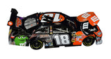 Signed Kyle Busch 2009 M&M’s Halloween NASCAR diecast car produced by Action Racing Collectables featuring unique seasonal graphics and collectible Joe Gibbs Racing design. This 1/24 scale model with COA is ideal for motorsports collectors, diecast enthusiasts, and Kyle Busch fans alike.