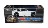 Detailed view of a Dale Earnhardt Jr. autographed #88 AMP Mountain Dew Ice Series 1/64 scale NASCAR diecast car from 2011. Produced by Action, this collectible combines the memorable AMP Energy sponsorship with a unique Ice Series appearance and includes a Certificate of Authenticity for added documentation.