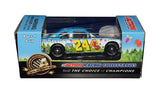 Detailed view of an autographed 2012 Jeff Gordon #24 Children’s Foundation Car Action 1/64 scale NASCAR diecast featuring artwork designed by Sam Bass. Personally signed by Jeff Gordon, this distinctive collectible includes a Certificate of Authenticity and combines Gordon’s racing legacy with a memorable Children’s Foundation themed design.