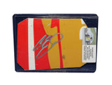 Displayed autographed Chase Elliott #9 Aaron’s Rookie ARCA Series Hendrick red and orange race-used NASCAR sheet metal with visible racing wear. Housed inside a protective plastic toploader, this trading-card-size collectible makes a great gift for Chase Elliott fans, Hendrick supporters, and racing memorabilia collectors.