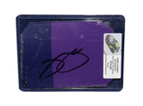Displayed autographed Jimmie Johnson #48 Ally Racing purple two-color race-used NASCAR sheet metal with visible track wear and Hendrick Motorsports styling. Housed inside a protective plastic toploader, this trading-card-size collectible makes a great gift for Jimmie Johnson fans and NASCAR memorabilia collectors.
