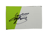 Close-up of signed Kyle Busch 2019 M&M’s Halloween Racing race-used sheet metal from Martinsville Speedway showcasing real race-used marks and vibrant NASCAR graphics. Includes a protective plastic toploader and makes a great gift for NASCAR fans and collectors alike.