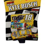 Signed Kyle Busch #18 M&M’s 2021 NASCAR Authentics Wave 12 Mini Car in 1/64 scale featuring the recognizable candy-themed Joe Gibbs Racing paint scheme. This compact NASCAR diecast has been autographed by Kyle Busch and includes a COA, making it an attractive display piece for racing memorabilia collectors.