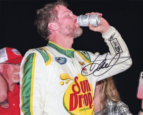 Autographed 8x10 photo of Dale Earnhardt Jr. celebrating at North Wilkesboro in the 2022 #3 Sun Drop Late Model after the race with a memorable beer chug. The bright colors and bold signature make this a great gift for collectors, and we are always here to help with any questions.