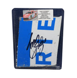 Displayed autographed Tony Stewart #14 Good Sam Camping World SRX Series race-used composite sheet metal with visible racing wear and distinctive track-used character. Housed inside a protective plastic toploader, this trading-card-size collectible makes a great gift for Tony Stewart fans, SRX enthusiasts, and racing memorabilia collectors.