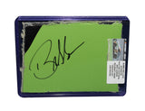 Displayed autographed Bubba Wallace #23 DraftKings Racing composite NASCAR sheet metal from the 2023 Loudon car with visible racing wear. Housed inside a protective plastic toploader, this trading-card-size collectible makes a great gift for Bubba Wallace fans, Loudon enthusiasts, and motorsports memorabilia collectors.