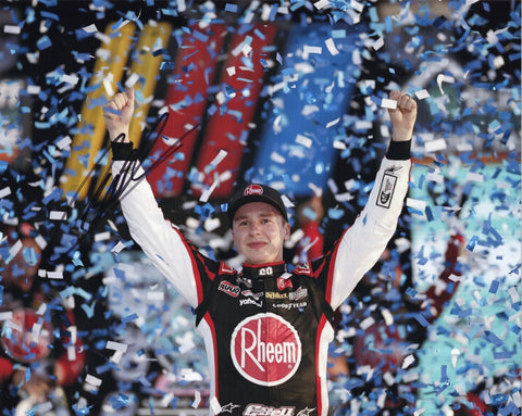 Autographed 8x10 NASCAR photo of Christopher Bell celebrating his 2023 Homestead Playoff Win in Victory Lane with the #20 Rheem Racing team. The signature is clearly shown, making it a strong collectible and a great gift for NASCAR fans. We are always here to help with any questions.