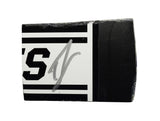 Autographed 2023 Ty Gibbs #54 Monster Energy race-used composite NASCAR sheet metal from his Bristol car during NASCAR’s 75th Anniversary season. This signed collectible is roughly the size of a standard trading card, fits inside a plastic toploader for protection and display, and includes a certificate of authenticity.