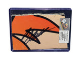 Displayed autographed AJ Allmendinger #16 Campers Inn RV NASCAR Xfinity Series race-used composite sheet metal with visible racing wear. Housed inside a protective plastic toploader, this trading-card-size collectible makes a great gift for AJ Allmendinger fans, Xfinity enthusiasts, and motorsports memorabilia collectors.