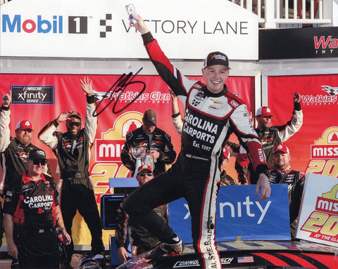Autographed 2024 Connor Zilisch #88 Carolina Carports Victory Lane photo showing Zilisch celebrating his Watkins Glen win beside the car, with his signature clearly displayed. A standout NASCAR collectible that makes a great gift. We are always here to help with any questions.