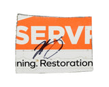 Race-used composite sheet metal from Noah Gragson’s 2024 #10 Overstock Racing NASCAR car driven at Sonoma Raceway. This signed memorabilia piece measures roughly the size of a standard trading card, includes a certificate of authenticity, and fits inside a plastic toploader for convenient protection and display.