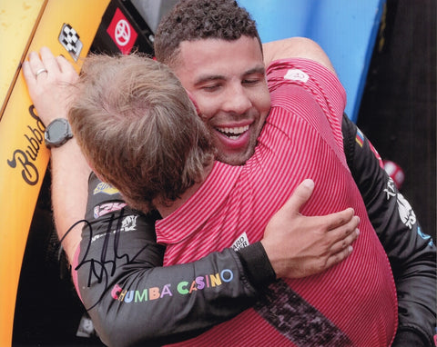 Autographed 8x10 photo of Bubba Wallace sharing an emotional Victory Lane hug after his 2025 Indy Brickyard win in the #23 Chumba Casino car. The bold signature adds collectible appeal, and the moment captures genuine celebration. It makes a great gift, and we are always here to help with any questions.
