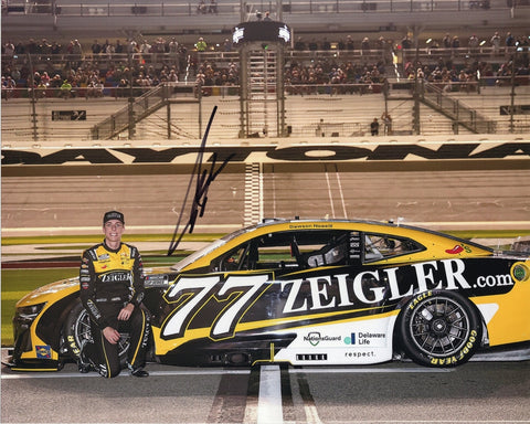 Autographed 2025 Carson Hocevar #77 Ziegler Racing Daytona 500 photo showcasing the colorful Spire Motorsports Chevrolet, Hocevar’s clear signature, and the energy of NASCAR’s biggest race. A meaningful collectible that makes a great gift. We are always here to help with any questions.