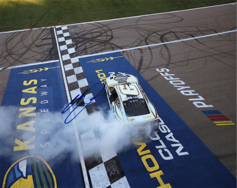 Autographed 8x10 photo of Chase Elliott performing a finish-line burnout after winning the 2025 Kansas Playoff race in the No. 9 Kelley Blue Book car. Includes COA and makes a great gift for NASCAR fans. We are always here to help with any questions.