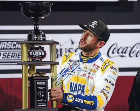 Autographed 8x10 photo showing Chase Elliott in Victory Lane at Bowman Gray holding the winner’s trophy beside the #9 NAPA Racing car. The signature is clear, and the moment captures a key 2025 race win. Includes COA and makes a great gift. We are always here to help with any questions.