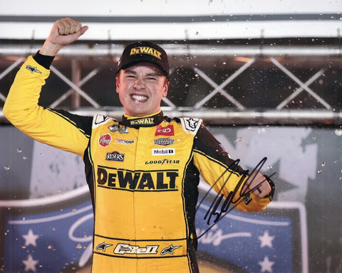 Autographed 8x10 glossy photo of Christopher Bell celebrating his 2025 Bristol race win beside the #20 DeWalt Racing Toyota, featuring vibrant colors and a clear signature. Ideal for NASCAR collectors and fans of Bell’s standout performances. It also makes a great gift, and we are always here to help with any questions.